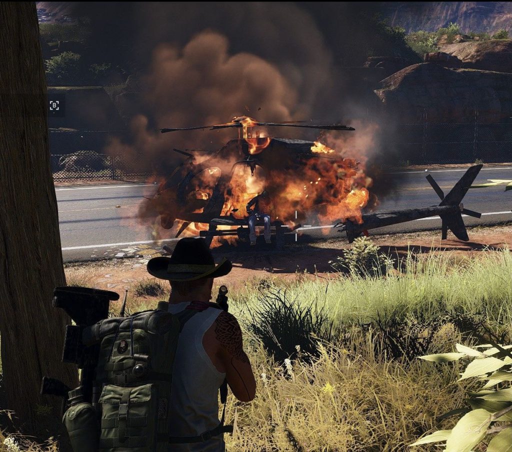 Ghost Recon Wildlands: a man sitting in a burning helicopter